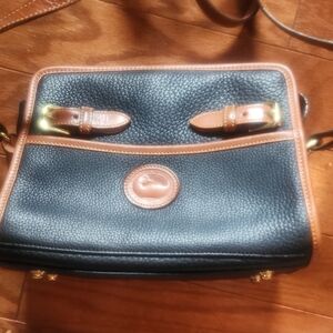 Dooney & Bourke Black and Tan Crossbody Bag with Classic Design